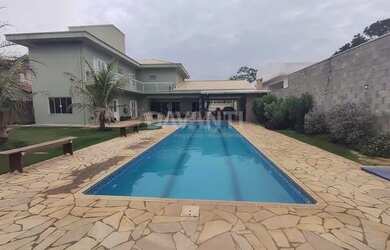 Imagem: A casa em condomínio possui 4 Dormitórios, 5 Banheiros, 5