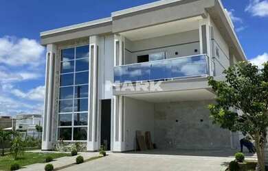 Imagem: A casa em condomínio possui 4 Dormitórios, 4 Banheiros, 2