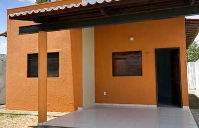 Imagem: A casa possui 2 Dormitórios, 1 Banheiro, 2 Vagas na garagem