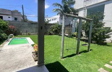 Imagem: A casa possui 4 Dormitórios, 4 Banheiros, 3 Vagas na garagem