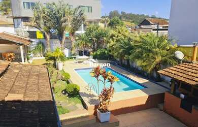 Imagem: A casa possui 3 Dormitórios, 2 Banheiros, 3 Vagas na garagem