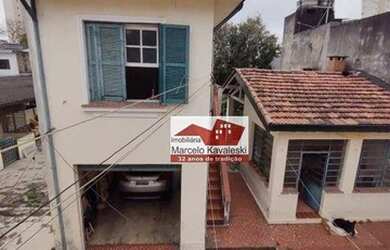 Imagem: A casa possui 3 Dormitórios, 3 Banheiros, 5 Vagas na garagem