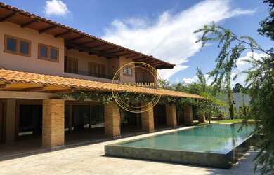 Imagem: A casa possui 5 Dormitórios, 5 Banheiros, 5 Vagas na garagem