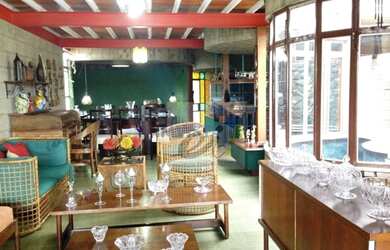 Imagem: A casa possui 4 Dormitórios, 5 Banheiros, 5 Vagas na garagem