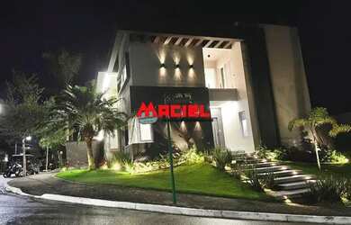 Imagem: A casa em condomínio possui 4 Dormitórios, 5 Banheiros, 4