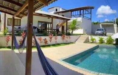 Imagem: A casa possui 3 Dormitórios, 3 Vagas na garagem e está localizado