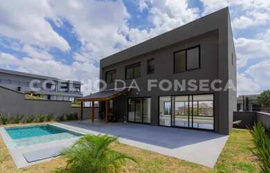 Imagem: A casa em condomínio possui 4 Dormitórios, 5 Banheiros, 4