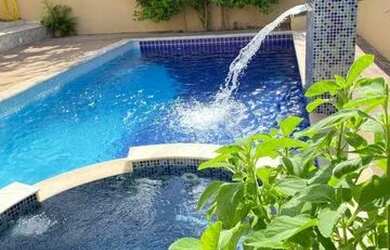 Imagem: A casa em condomínio possui 4 Dormitórios, 5 Banheiros, 4