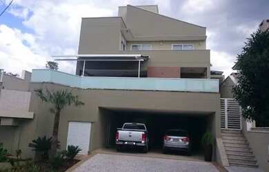 Imagem: A casa em condomínio possui 4 Dormitórios, 5 Banheiros, 4