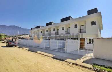 Imagem: A casa possui 2 Dormitórios, 3 Banheiros, 1 Vaga na garagem