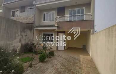 Imagem: A casa possui 3 Dormitórios, 2 Banheiros, 2 Vagas na garagem