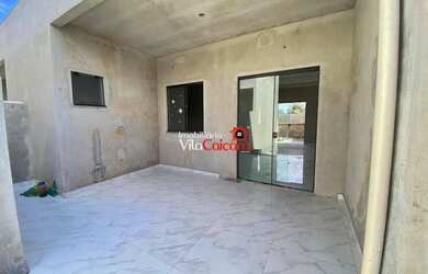 Imagem: A casa possui 2 Dormitórios, 2 Banheiros, 3 Vagas na garagem