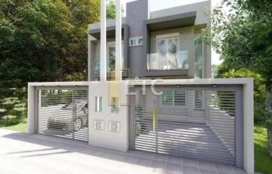 Imagem: A casa possui 3 Dormitórios, 3 Banheiros, 2 Vagas na garagem