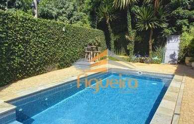 Imagem: A casa possui 3 Dormitórios, 3 Banheiros, 2 Vagas na garagem