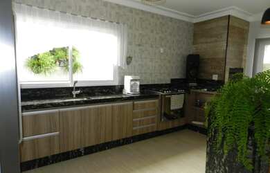 Imagem: A casa em condomínio possui 3 Dormitórios, 4 Banheiros, 4