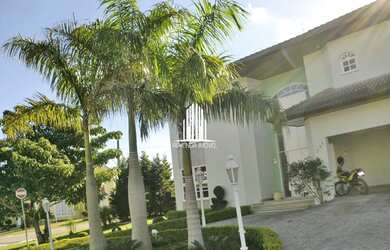 Imagem: A casa possui 1 Dormitório, 5 Banheiros, 4 Vagas na garagem