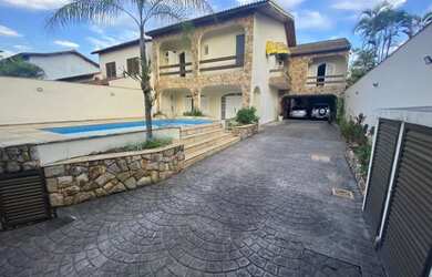 Imagem: A casa em condomínio possui 5 Dormitórios, 5 Banheiros, 5