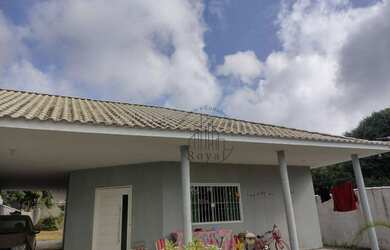 Imagem: A casa possui 3 Dormitórios, 2 Banheiros, 4 Vagas na garagem