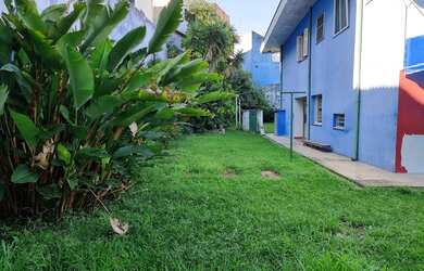 Imagem: A casa possui 5 Dormitórios, 4 Banheiros, 3 Vagas na garagem