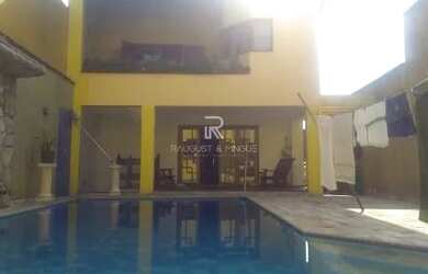 Imagem: A casa possui 3 Dormitórios, 5 Banheiros, 5 Vagas na garagem