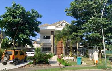 Imagem: A casa em condomínio possui 5 Dormitórios, 5 Banheiros, 3