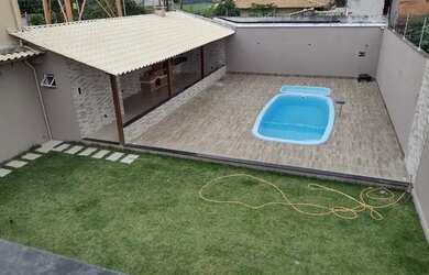 Imagem: A casa possui 4 Dormitórios, 5 Banheiros, 3 Vagas na garagem