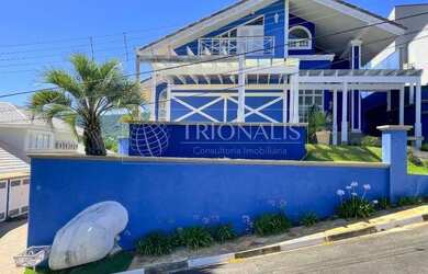 Imagem: A casa em condomínio possui 4 Dormitórios, 5 Banheiros, 5