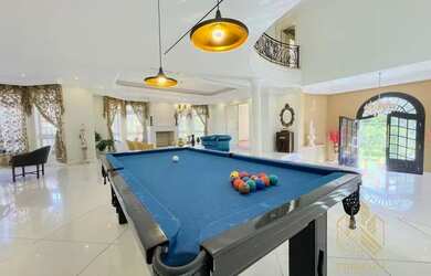 Imagem: A casa em condomínio possui 5 Dormitórios, 5 Banheiros, 5