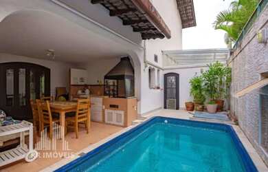 Imagem: A casa em condomínio possui 4 Dormitórios, 5 Banheiros, 4