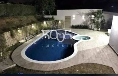 Imagem: A casa em condomínio possui 4 Dormitórios, 5 Banheiros, 2