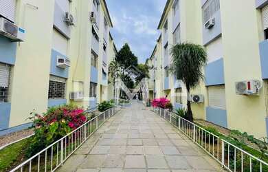 Imagem: O apartamento possui 1 Dormitório, 1 Banheiro, 1 Vaga na garagem