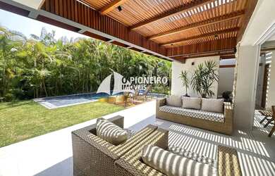 Imagem: A casa em condomínio possui 4 Dormitórios, 4 Banheiros, 3