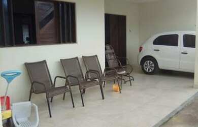 Imagem: A casa possui 3 Dormitórios, 1 Vaga na garagem e está localizado