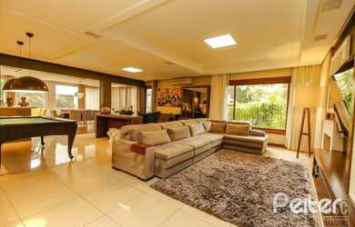 Imagem: A casa em condomínio possui 3 Dormitórios, 3 Banheiros, 3