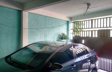 Imagem: A casa possui 3 Dormitórios, 3 Banheiros, 2 Vagas na garagem