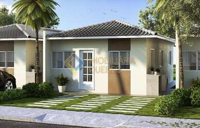 Imagem: A casa possui 3 Dormitórios, 2 Banheiros, 2 Vagas na garagem