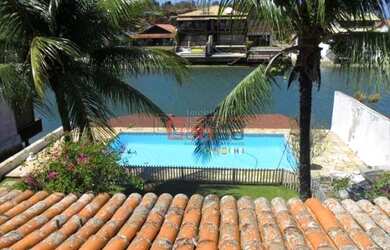 Imagem: A casa possui 5 Dormitórios, 5 Banheiros, 5 Vagas na garagem