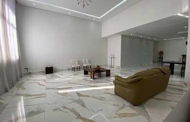 Imagem: A casa possui 4 Dormitórios, 4 Banheiros, 400m² de Área e