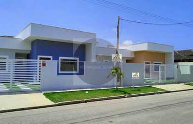 Imagem: A casa possui 3 Dormitórios, 2 Banheiros, 3 Vagas na garagem