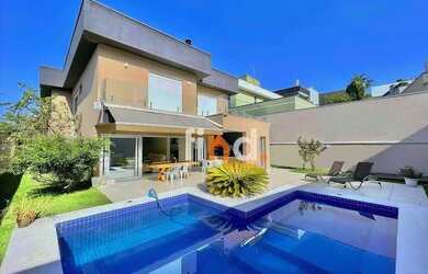 Imagem: A casa em condomínio possui 4 Dormitórios, 5 Banheiros, 4