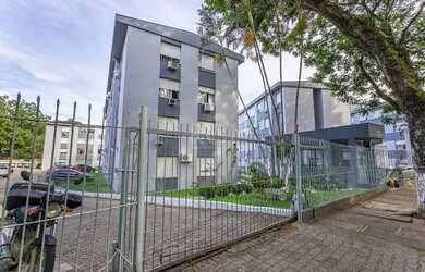 Imagem: O apartamento possui 1 Dormitório, 1 Banheiro, 1 Vaga na garagem