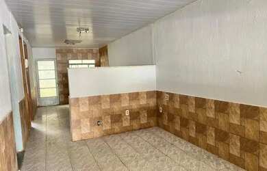 Imagem: A casa possui 2 Dormitórios, 2 Banheiros e está localizado