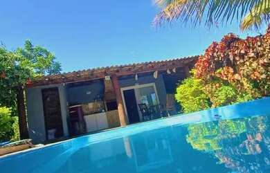 Imagem: A casa possui 2 Dormitórios, 2 Vagas na garagem e está localizado