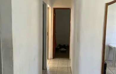 Imagem: O apartamento possui 2 Dormitórios, 1 Banheiro, 2 Vagas na