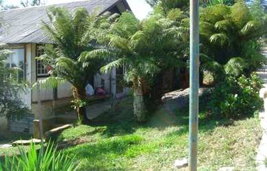 Imagem: A casa possui 5 Dormitórios, 3 Banheiros, 2 Vagas na garagem