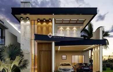 Imagem: A casa possui 3 Dormitórios, 2 Banheiros, 4 Vagas na garagem