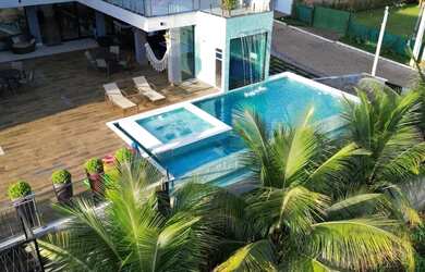 Imagem: A casa em condomínio possui 5 Dormitórios, 5 Banheiros, 5