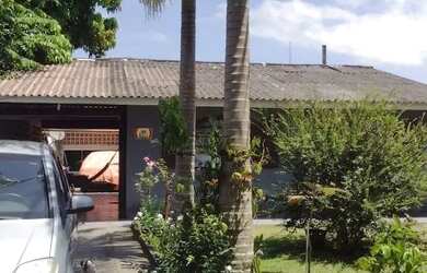 Imagem: A casa possui 5 Dormitórios, 5 Banheiros, 5 Vagas na garagem