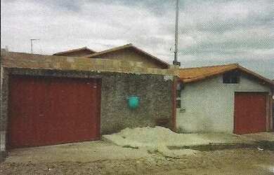 Imagem: A casa possui 2 Dormitórios, 1 Banheiro, 1 Vaga na garagem