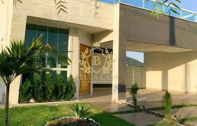 Imagem: A casa possui 3 Dormitórios, 4 Banheiros, 4 Vagas na garagem